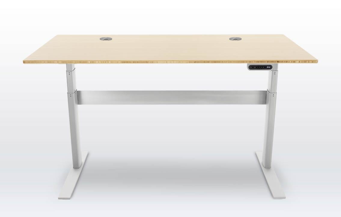 light brown standing desk with white legs
