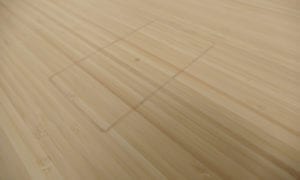 wireless charger outline on natural bamboo stand desk desk top